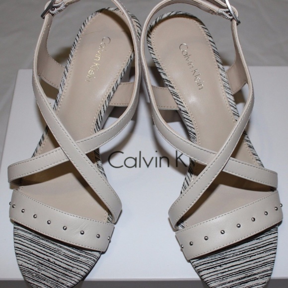 CALVIN KLEIN SFT WHT PAMILLA COW MALSY WDGE SANDAL - Picture 1 of 5